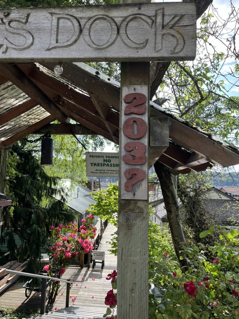 The dock where Jasmine now lives, address marked at the entrance.