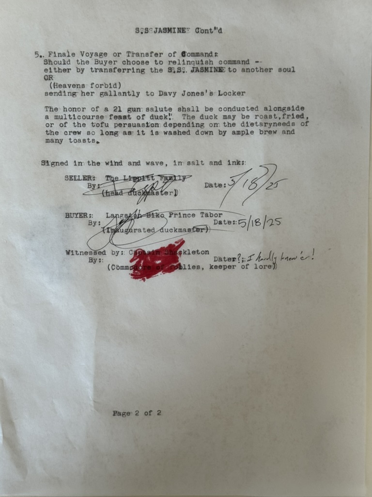 Close view of the typed transfer document, signature page.
